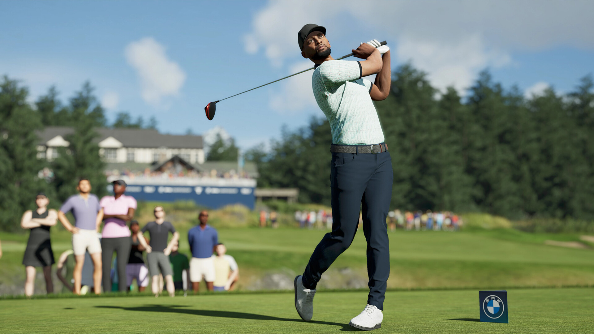 Golfista profesional ejecutando un swing perfecto en un campo de PGA TOUR 2K25
